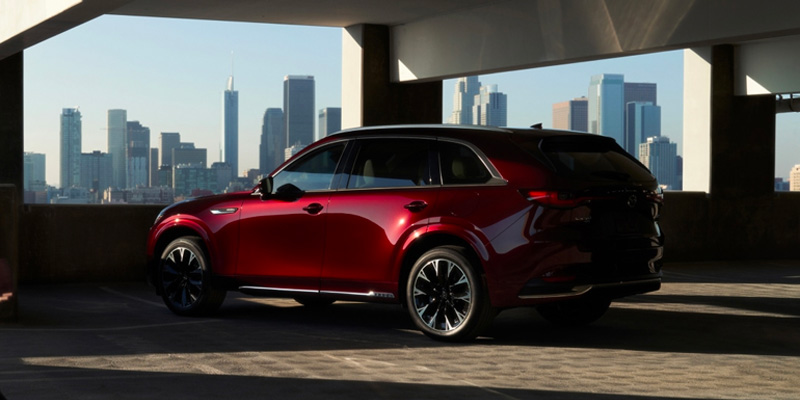 Red Mazda CX-90 side view